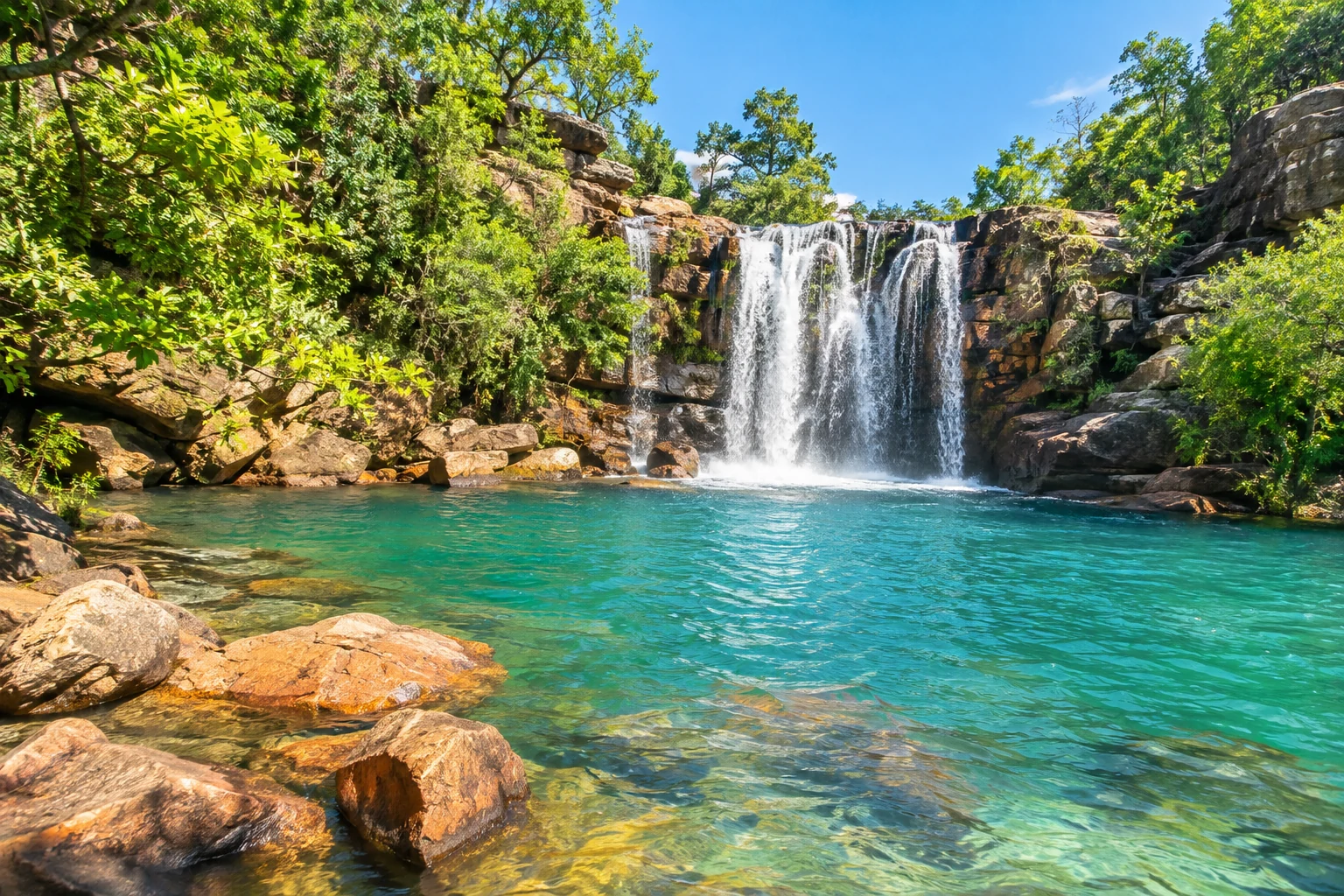 Illustrative photo of a seasonal waterfall and cyan pool